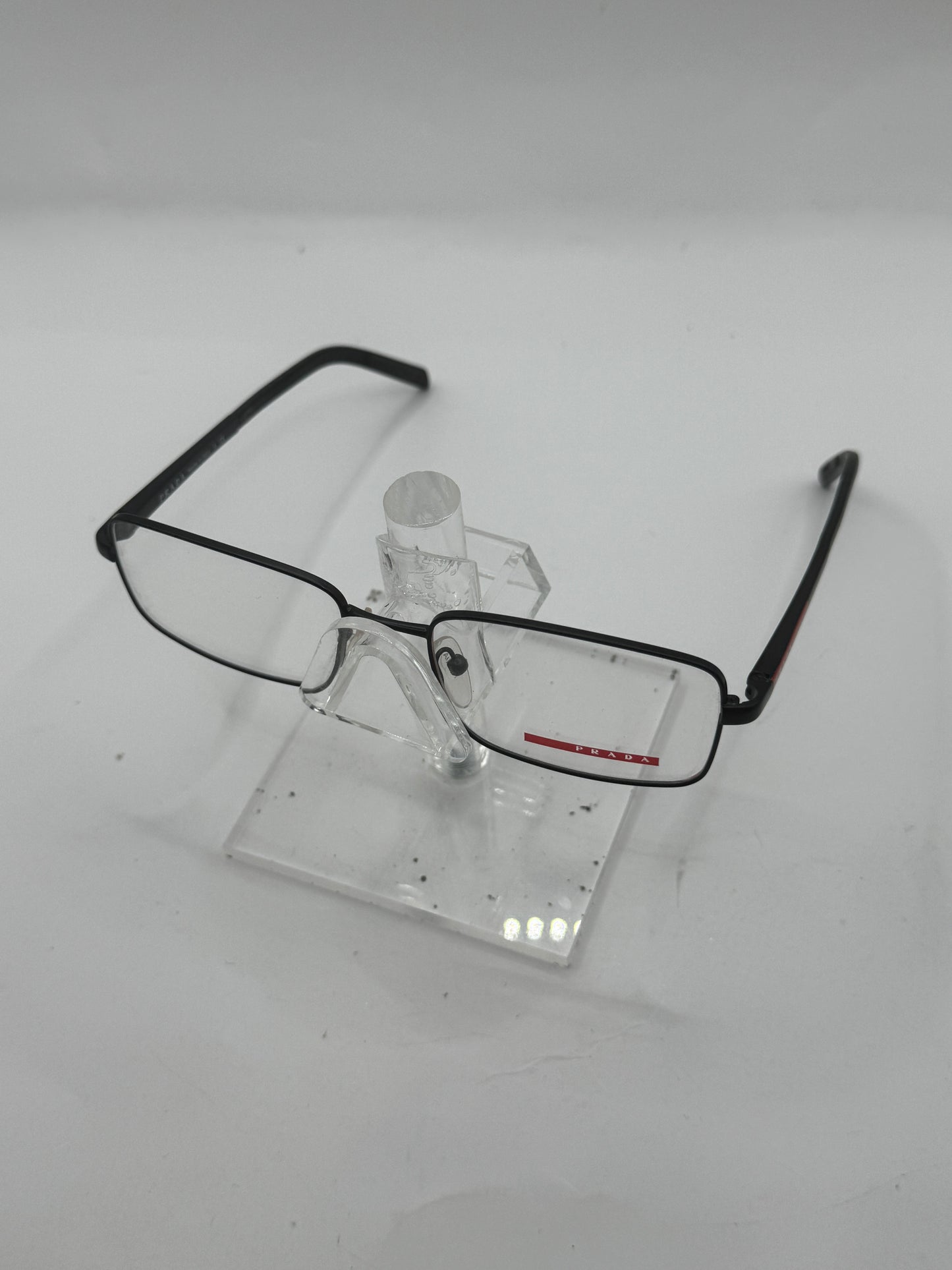 Prada Vps56a Eyeglasses in color 1bo1o1