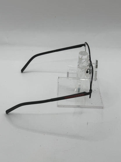 Prada Vps56a Eyeglasses in color 1bo1o1