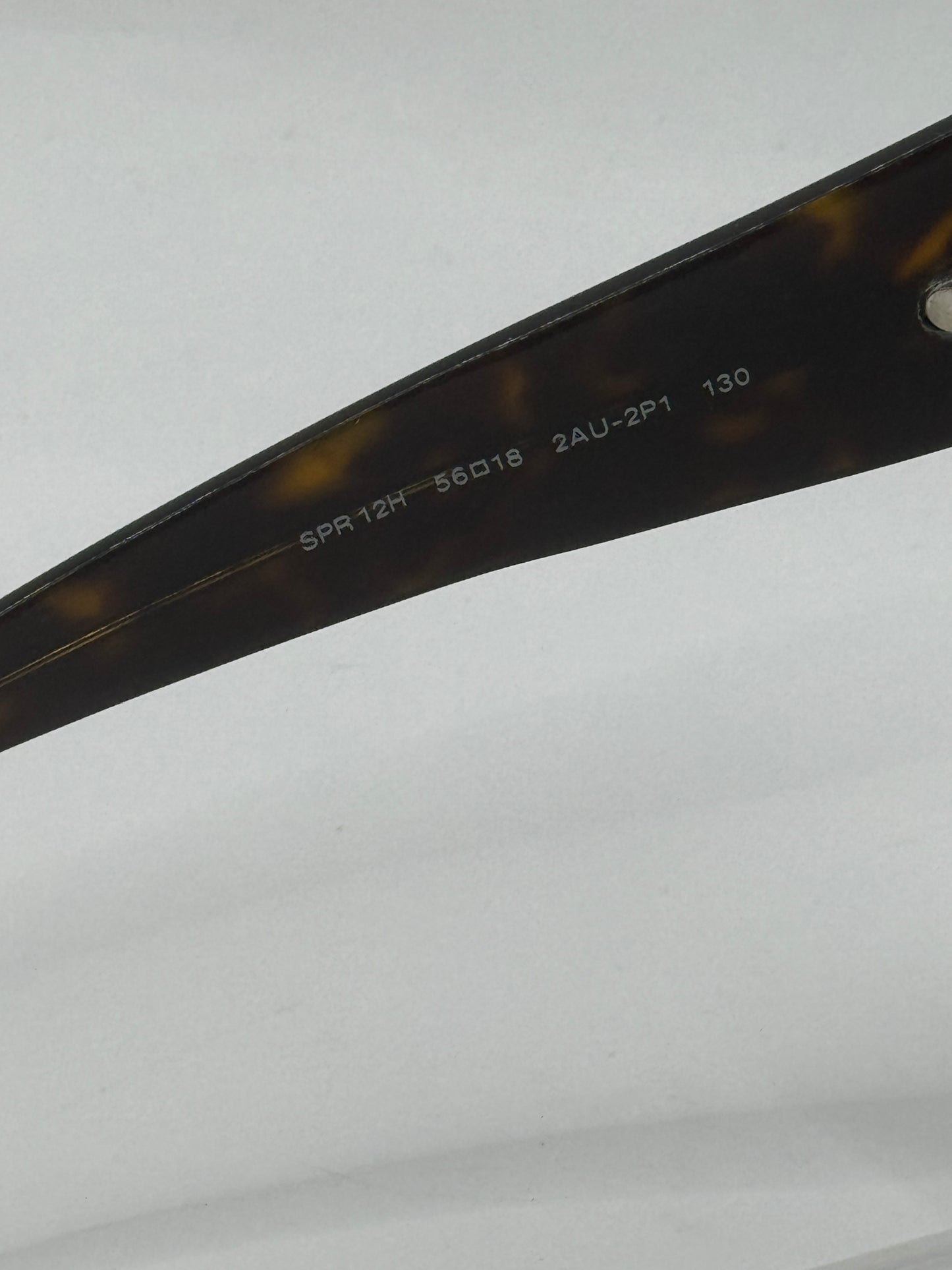 Prada Spr12h Sunglasses in color 2au2p1