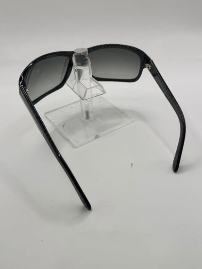 Prada Spr02i Sunglasses in color 7ns3m1