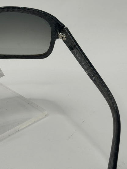 Prada Spr02i Sunglasses in color 7ns3m1