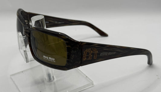 Miu Miu 09g Sunglasses in color 8ax3n1