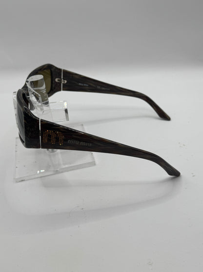 Miu Miu 09g Sunglasses in color 8ax3n1
