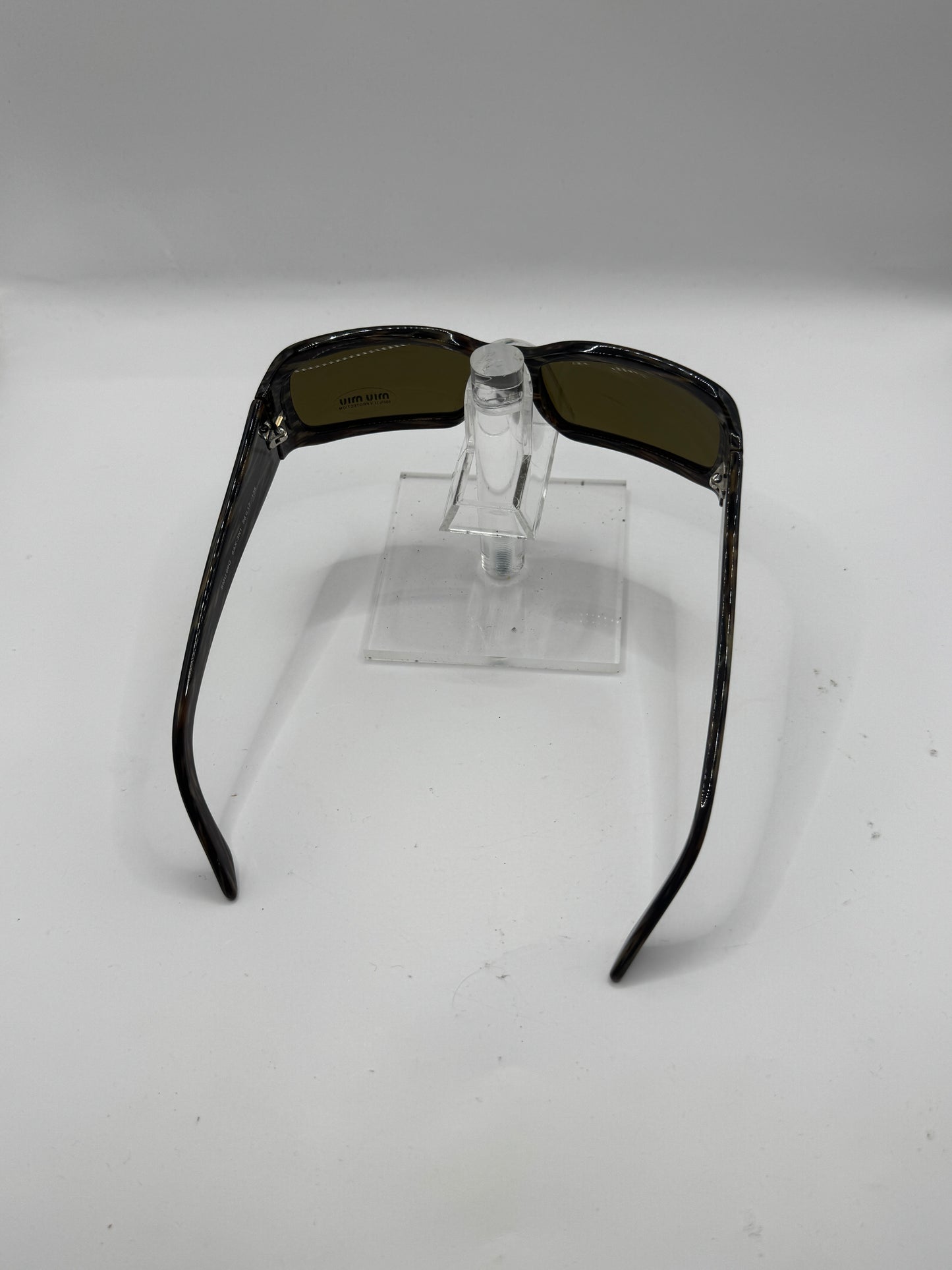 Miu Miu 09g Sunglasses in color 8ax3n1