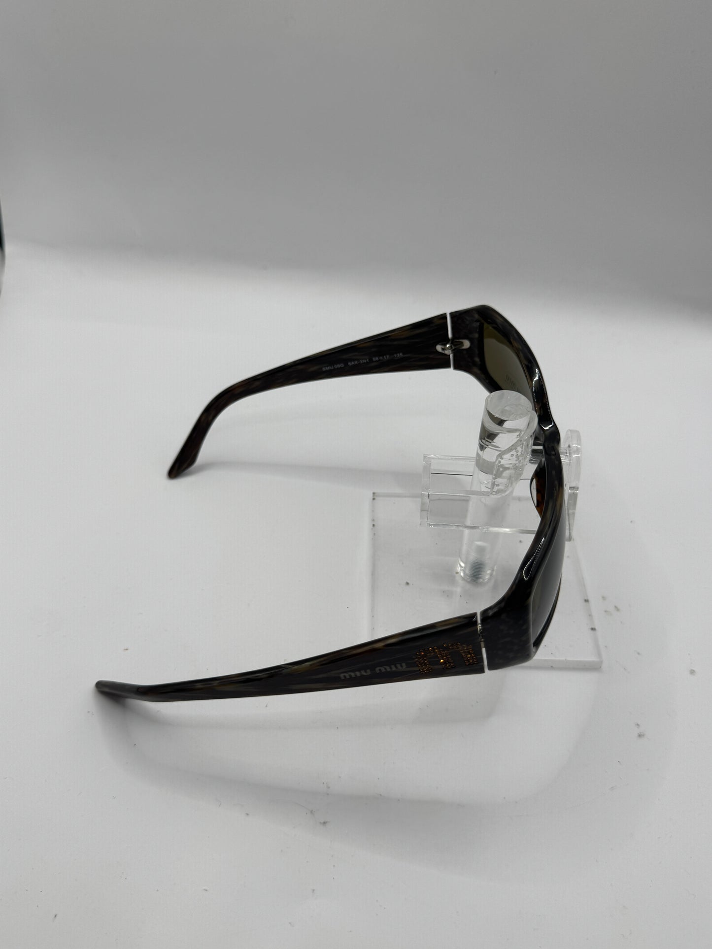 Miu Miu 09g Sunglasses in color 8ax3n1