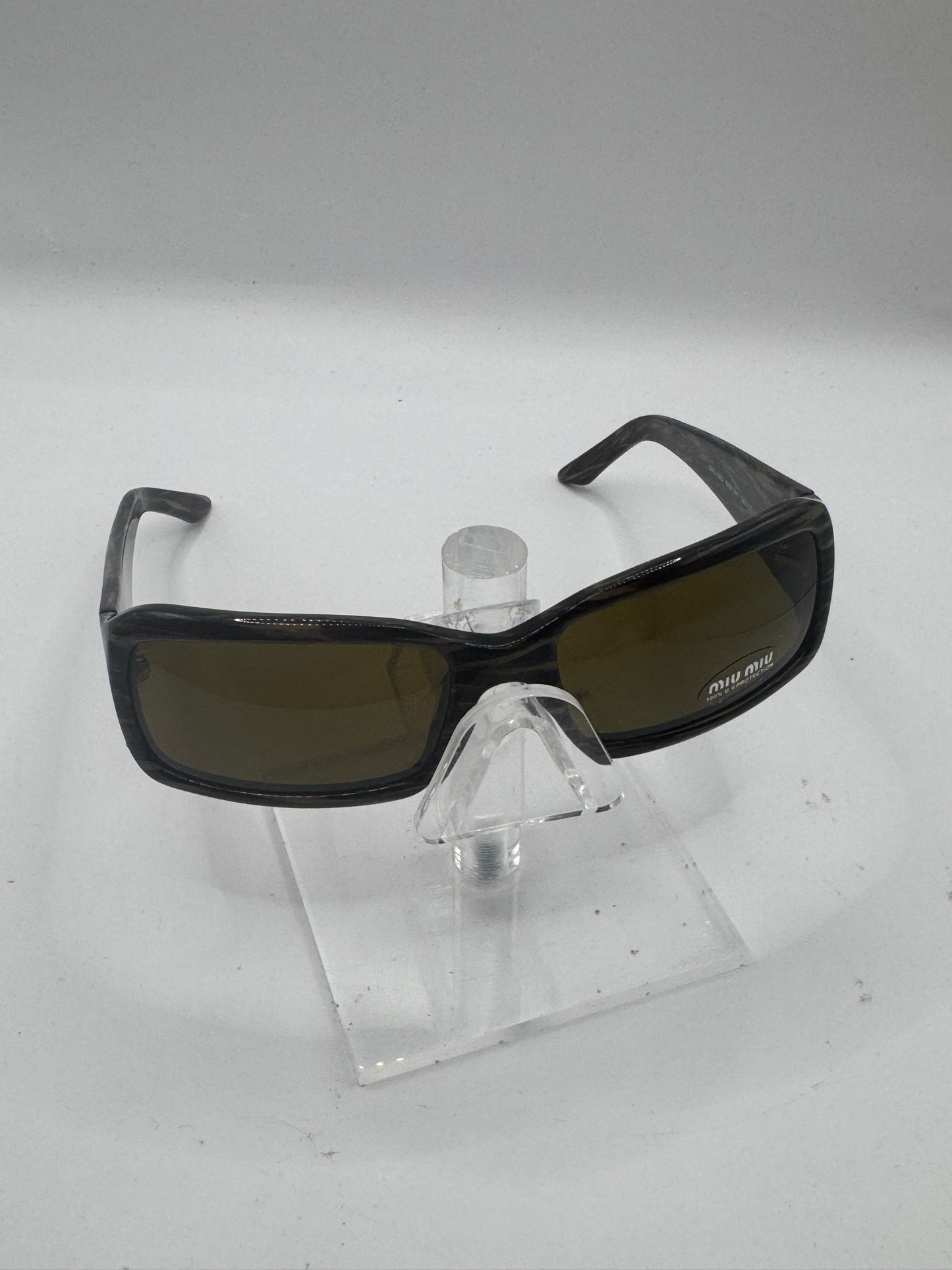 Miu Miu 09g Sunglasses in color 8ax3n1