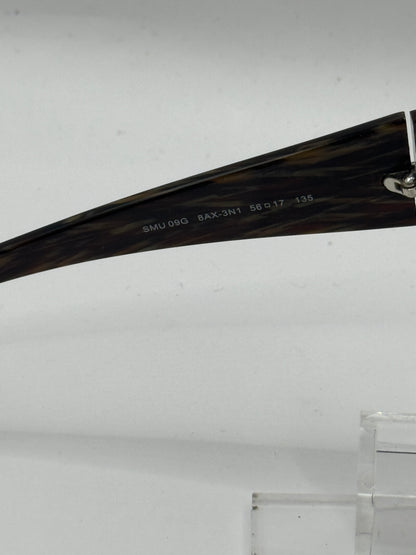 Miu Miu 09g Sunglasses in color 8ax3n1