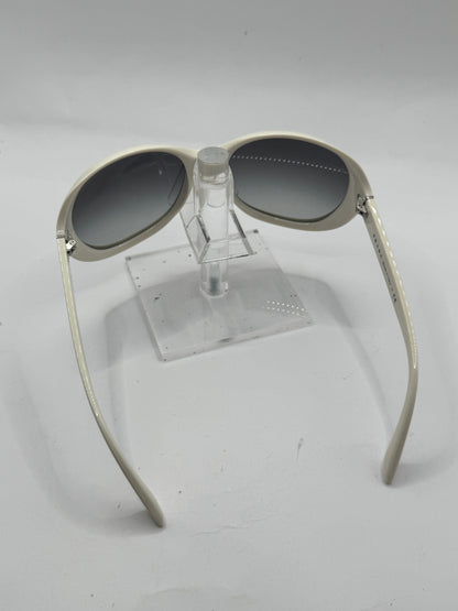 Prada Spr04o Sunglasses in color 7s33m1