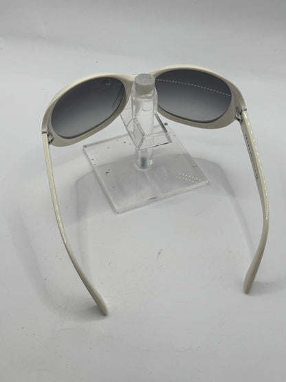 Prada Spr04o Sunglasses in color 7s33m1