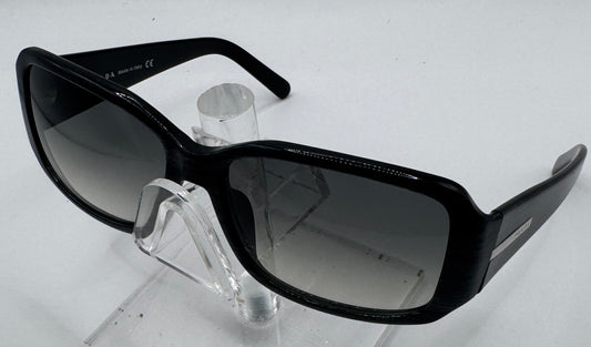 Prada Spr14h Sunglasses in color 7br3m1