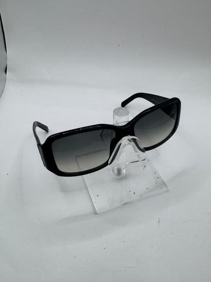 Prada Spr14h Sunglasses in color 7br3m1