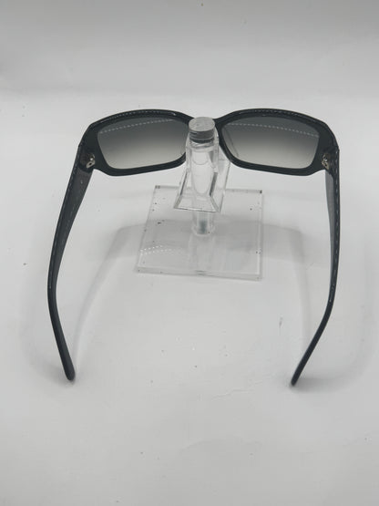 Prada Spr14h Sunglasses in color 7br3m1