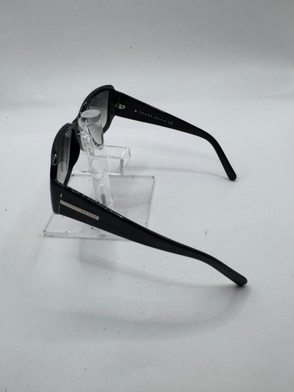 Prada Spr14h Sunglasses in color 7br3m1