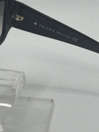 Prada Spr14h Sunglasses in color 7br3m1