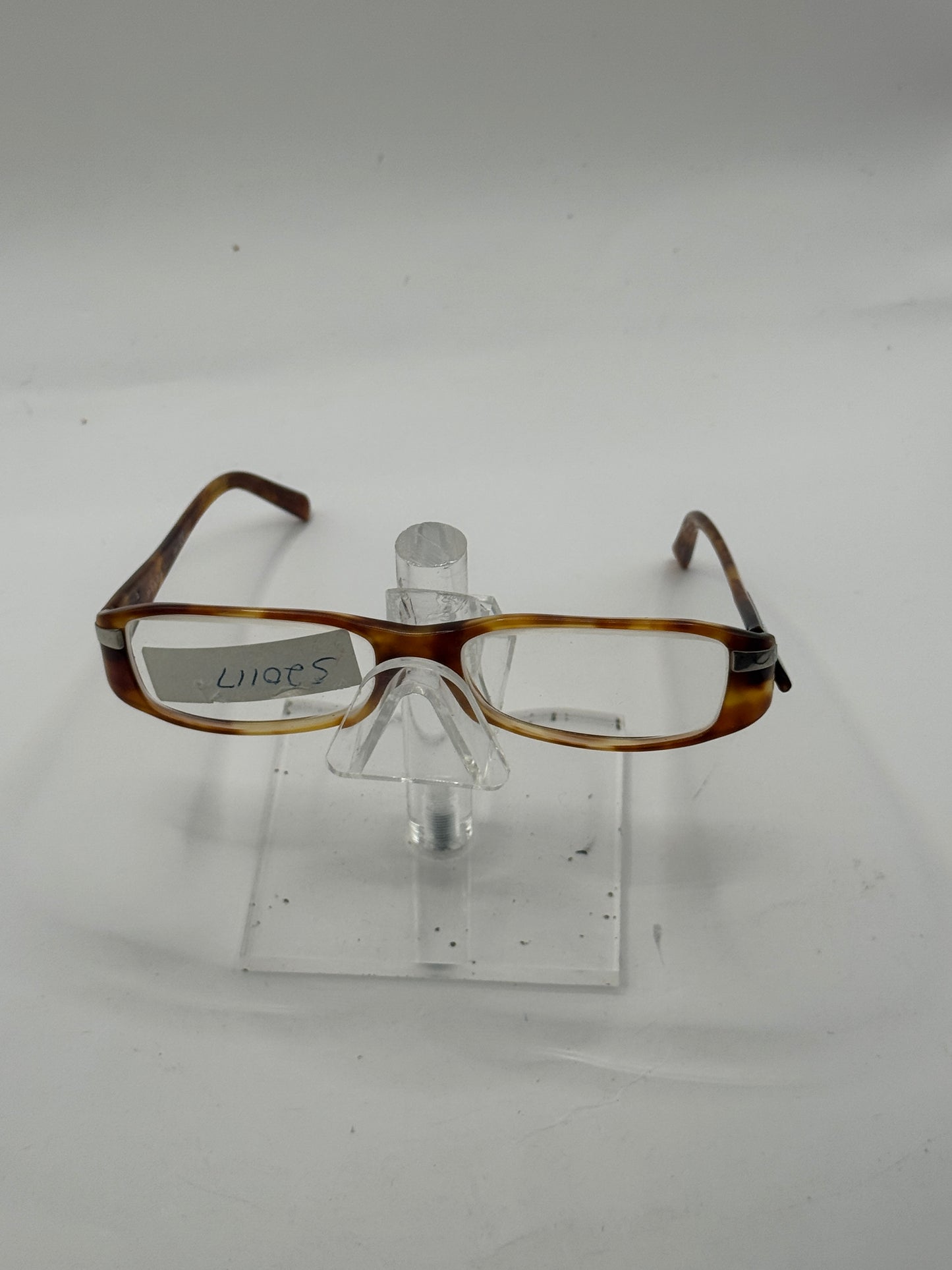 Prada Vpr14h Eyeglasses in color 4bw1o1