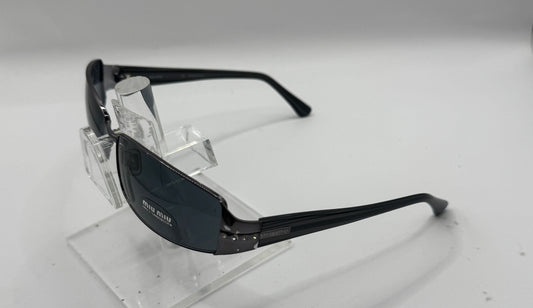 Miu Miu 61e Sunglasses in color 5av1a1