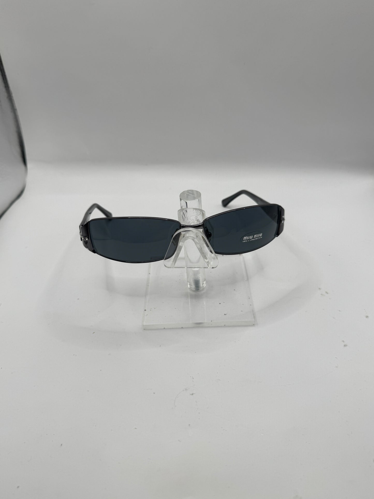 Miu Miu 61e Sunglasses in color 5av1a1