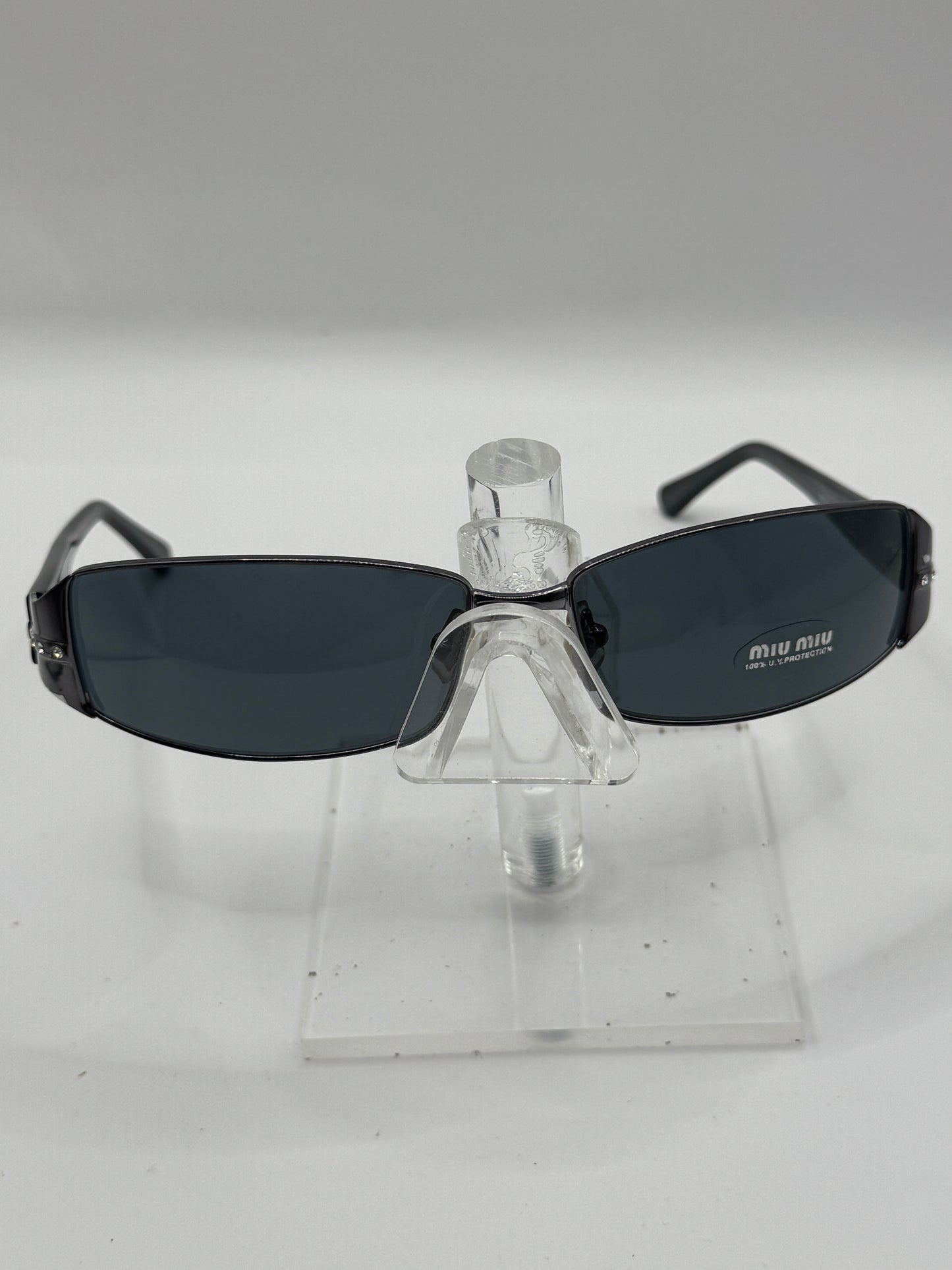 Miu Miu 61e Sunglasses in color 5av1a1