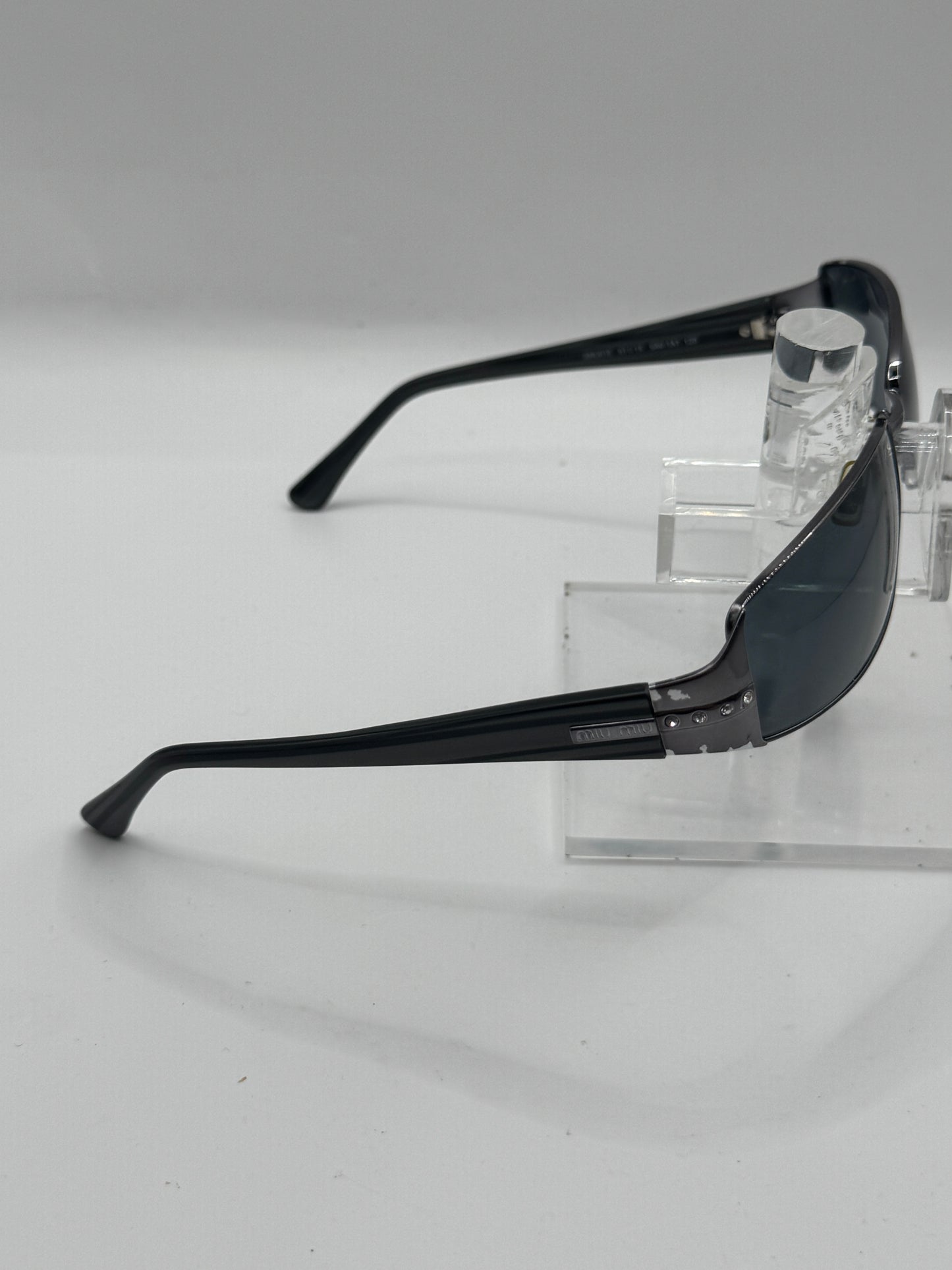 Miu Miu 61e Sunglasses in color 5av1a1