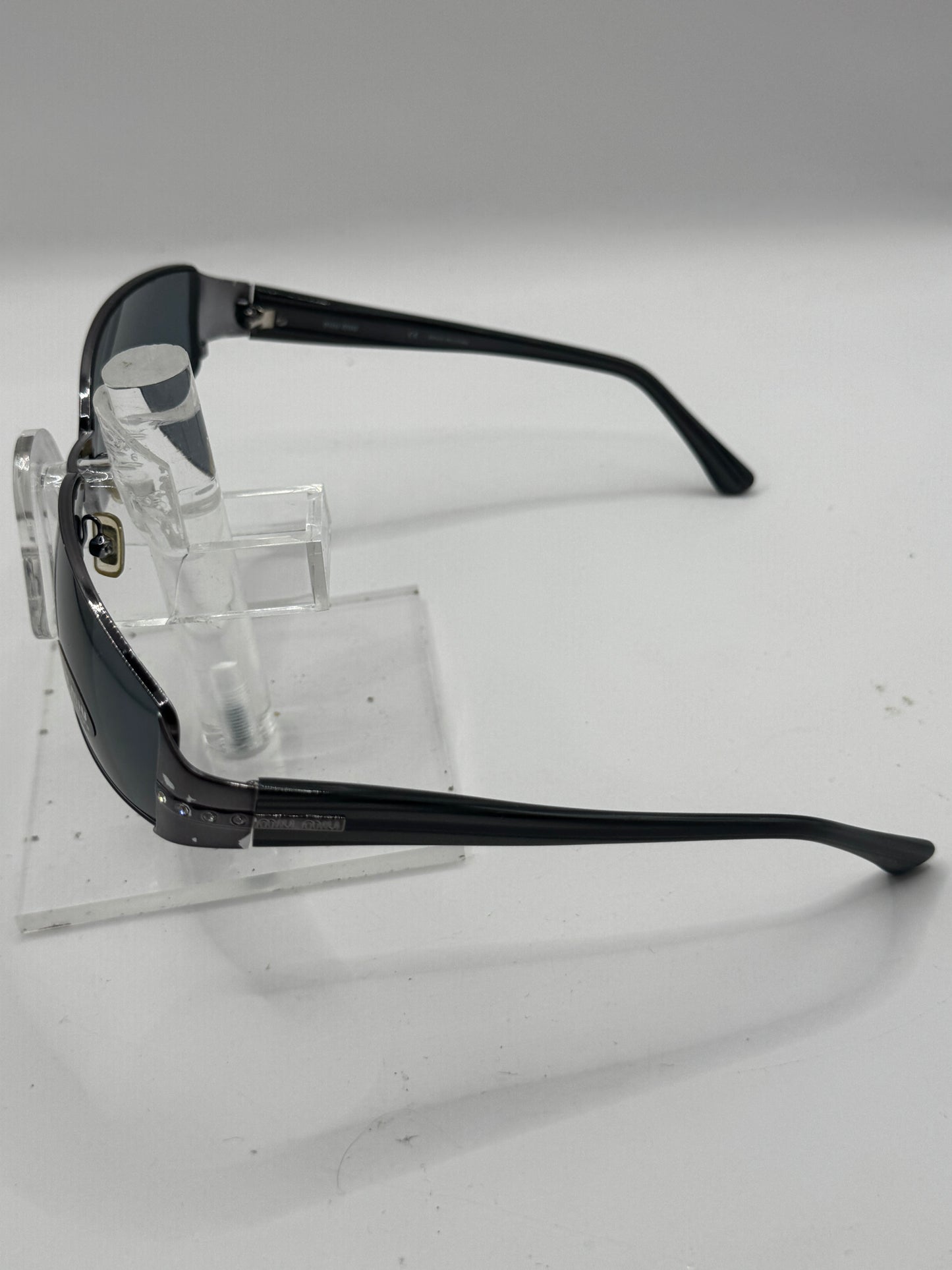 Miu Miu 61e Sunglasses in color 5av1a1