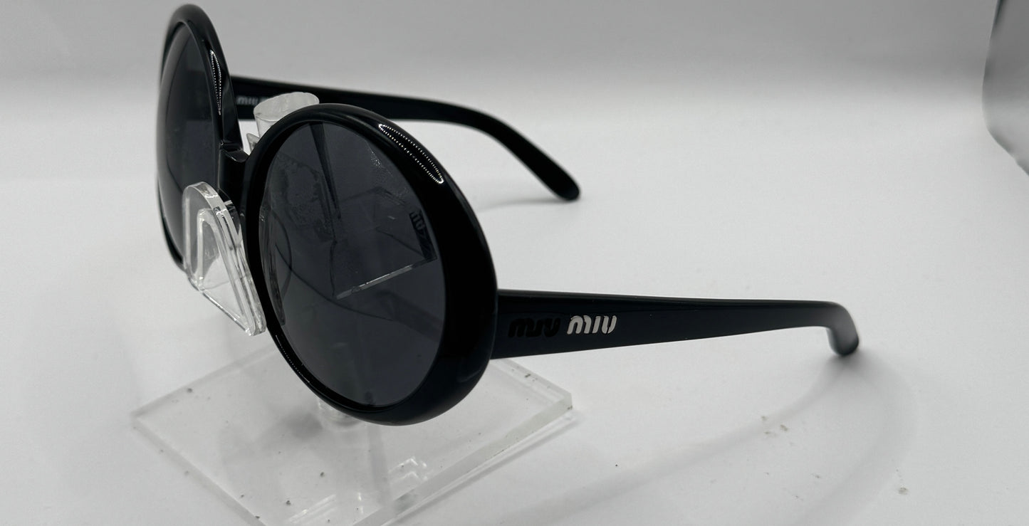 Miu Miu 13hs Sunglasses in color 1ab1a1
