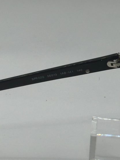 Prada Spr02g Sunglasses in color 1ab1a1