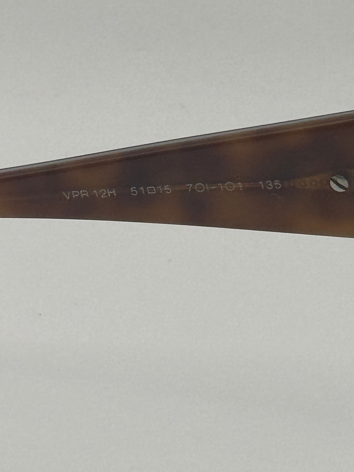 Prada Vpr12h Eyeglasses in color 70i1o1