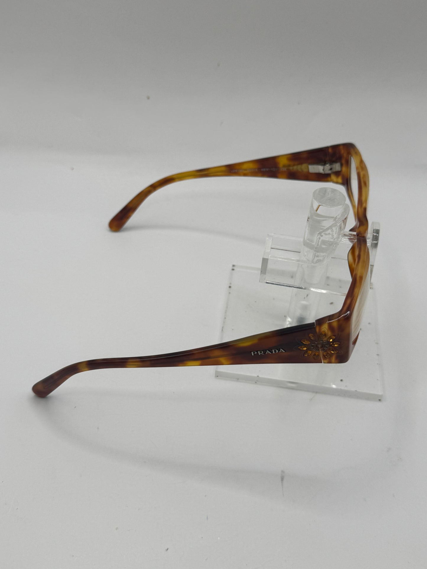 Prada Vpr18h Eyeglasses in color 4bw1o1