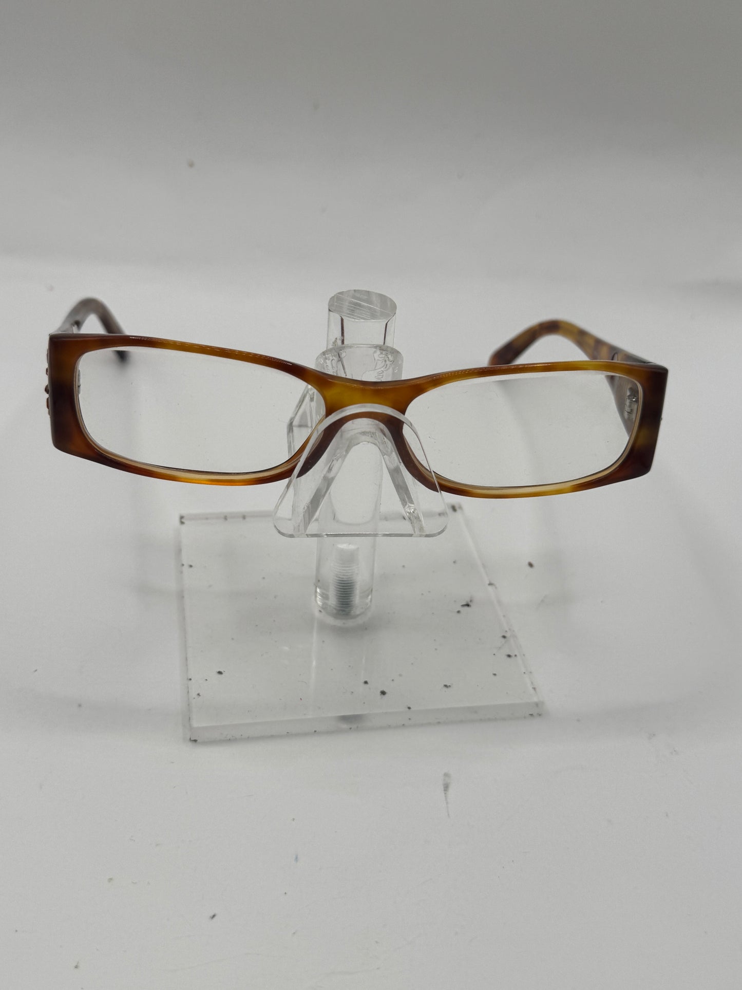 Prada Vpr18h Eyeglasses in color 4bw1o1