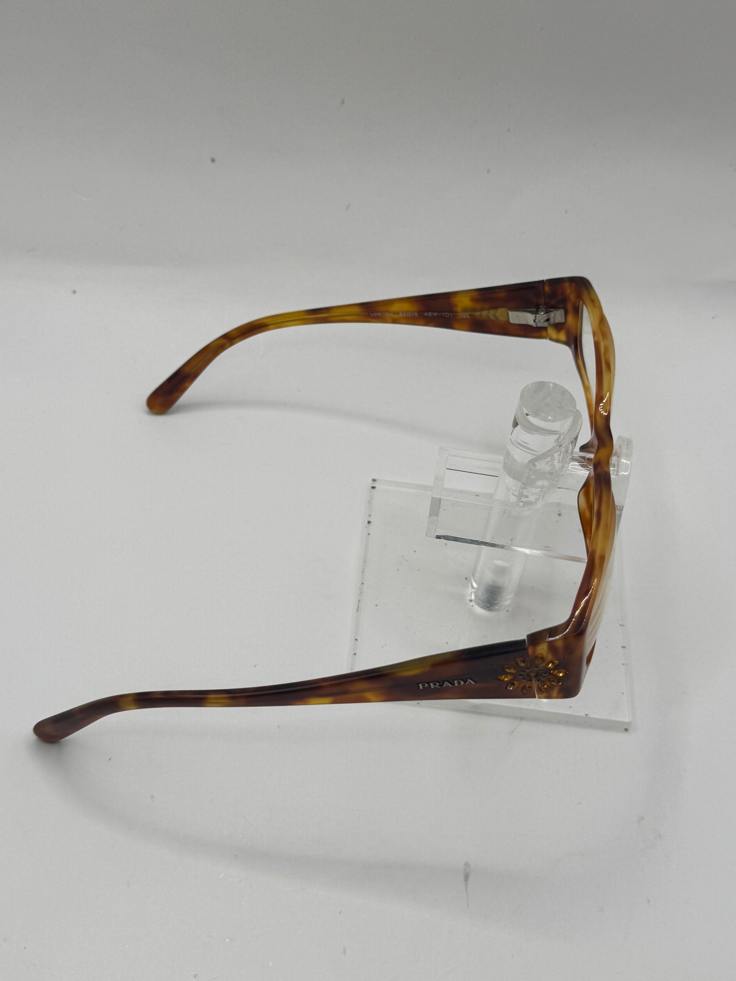 Prada Vpr18h Eyeglasses in color 4bw1o1