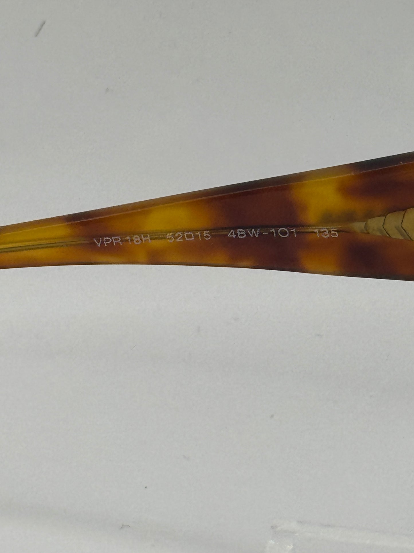 Prada Vpr18h Eyeglasses in color 4bw1o1