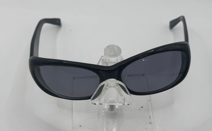 Oliver Peoples Phoebe Sunglasses in color Black