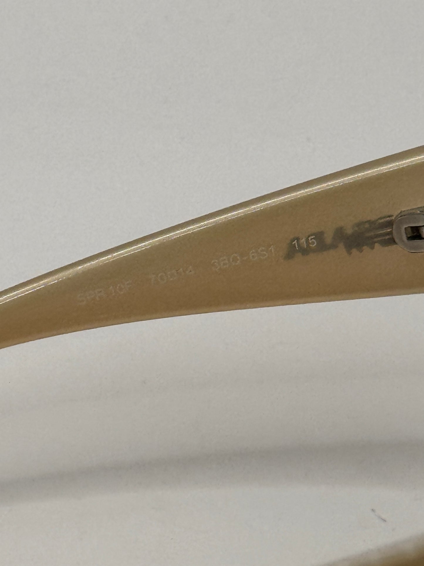 Prada Spr10f Sunglasses in color 3bq6s1