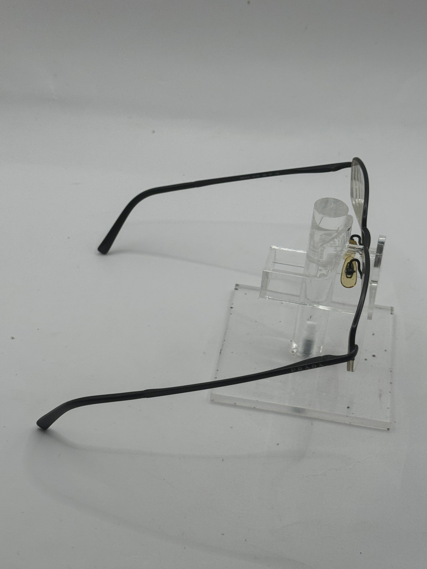 Prada Vpr57h Eyeglasses in color 1bo1o1