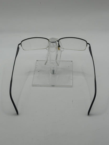 Prada Vpr57h Eyeglasses in color 1bo1o1