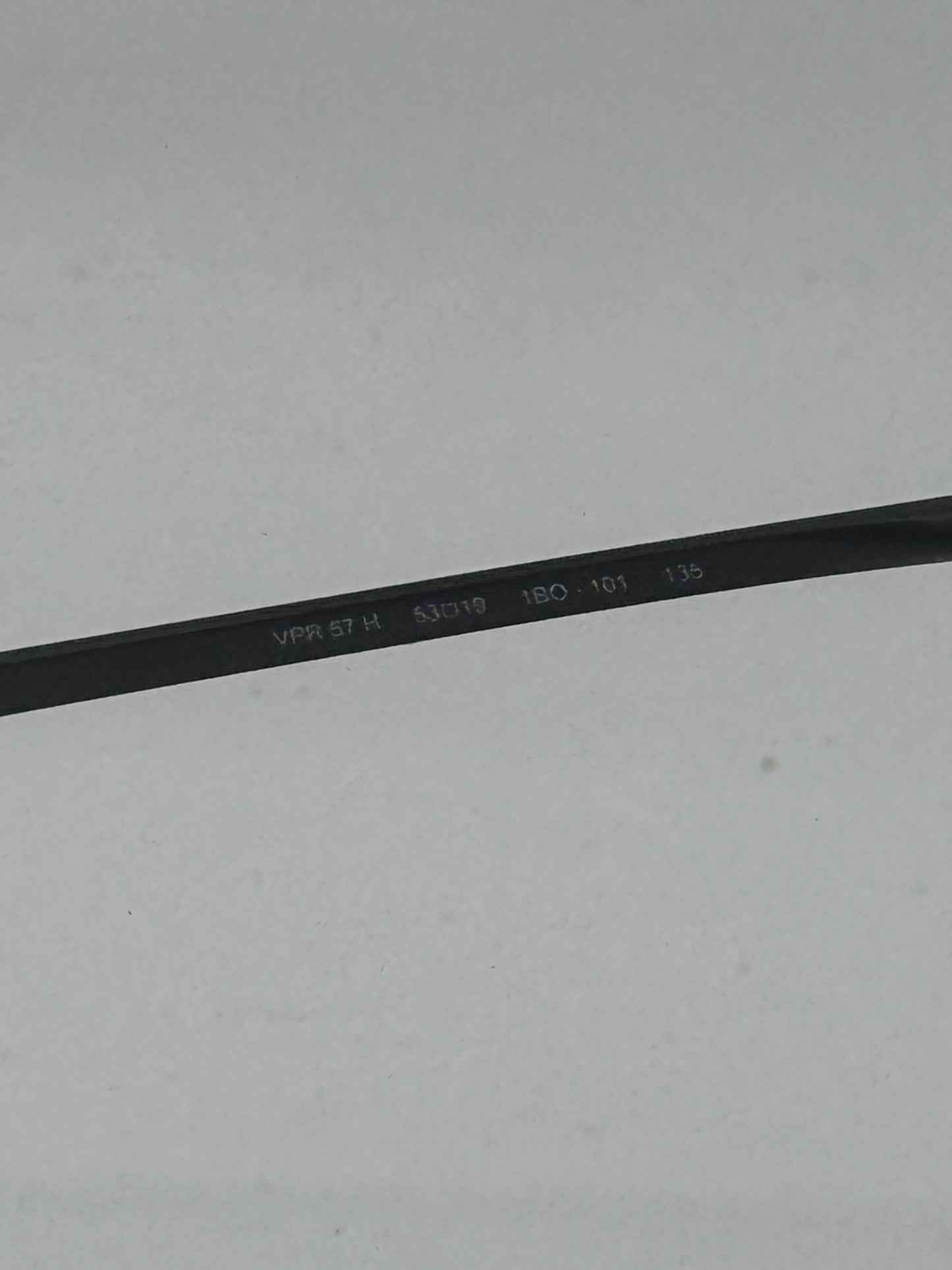 Prada Vpr57h Eyeglasses in color 1bo1o1