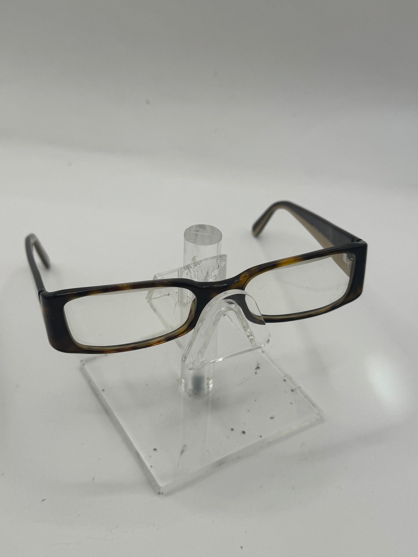 Prada Vpr16g Eyeglasses in color 7661o1
