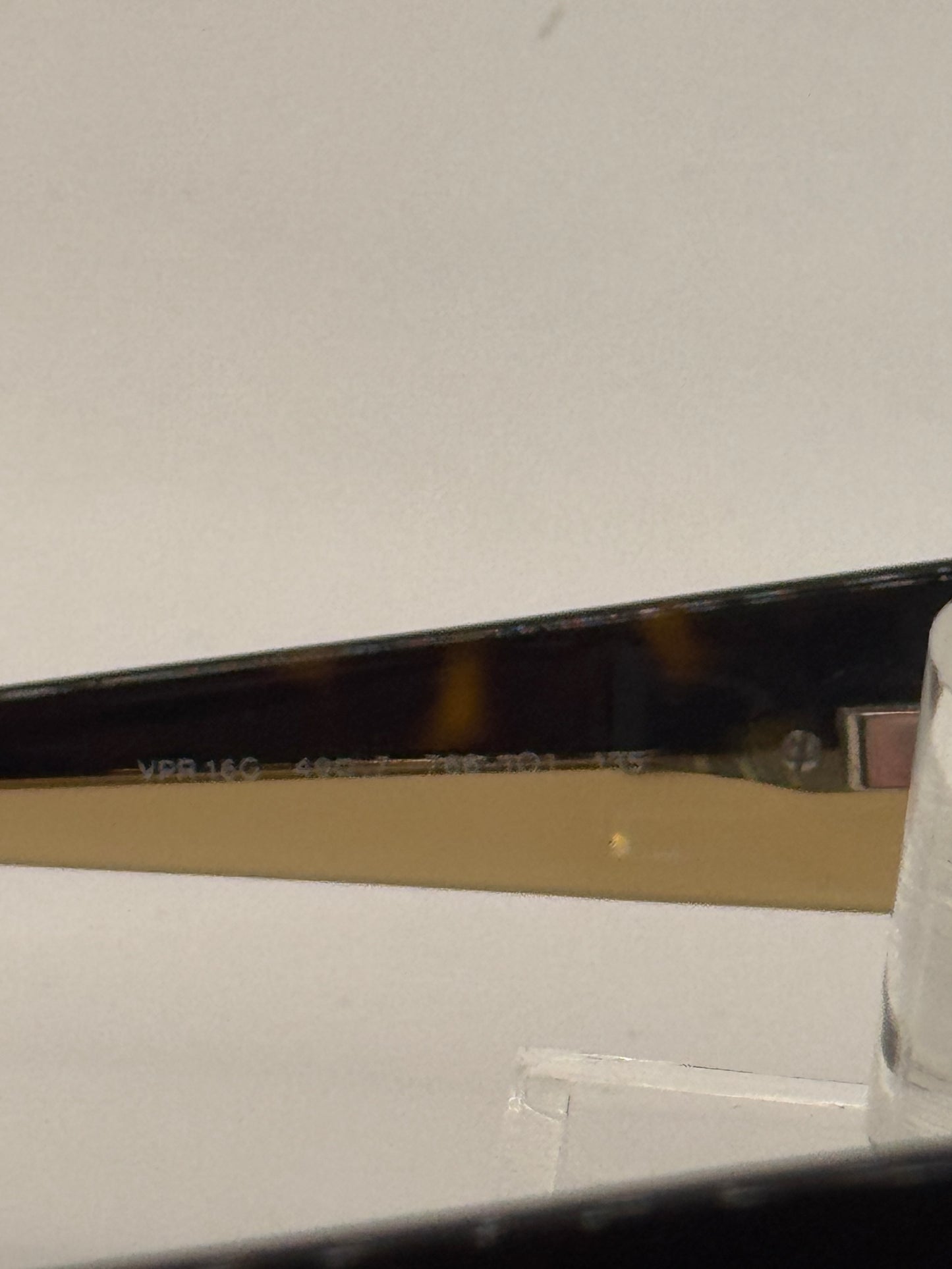 Prada Vpr16g Eyeglasses in color 7661o1