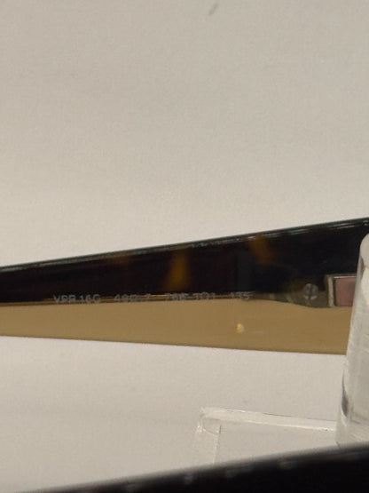 Prada Vpr16g Eyeglasses in color 7661o1
