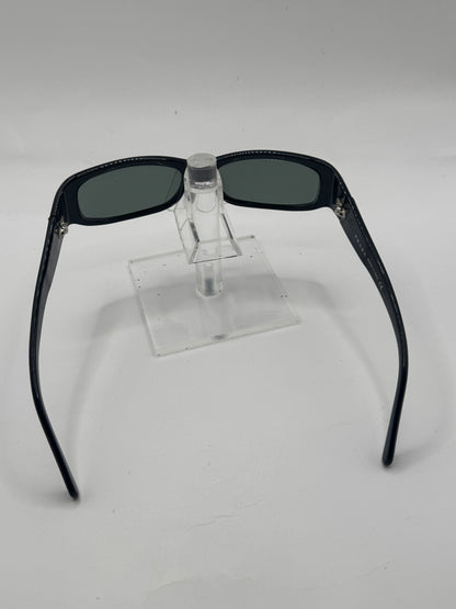 Prada Spr20g Sunglasses in color 1ab1a1