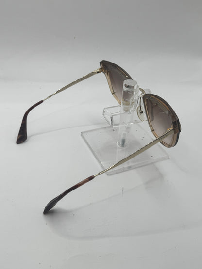 Prada Spr12u Sunglasses in color Kof0a6