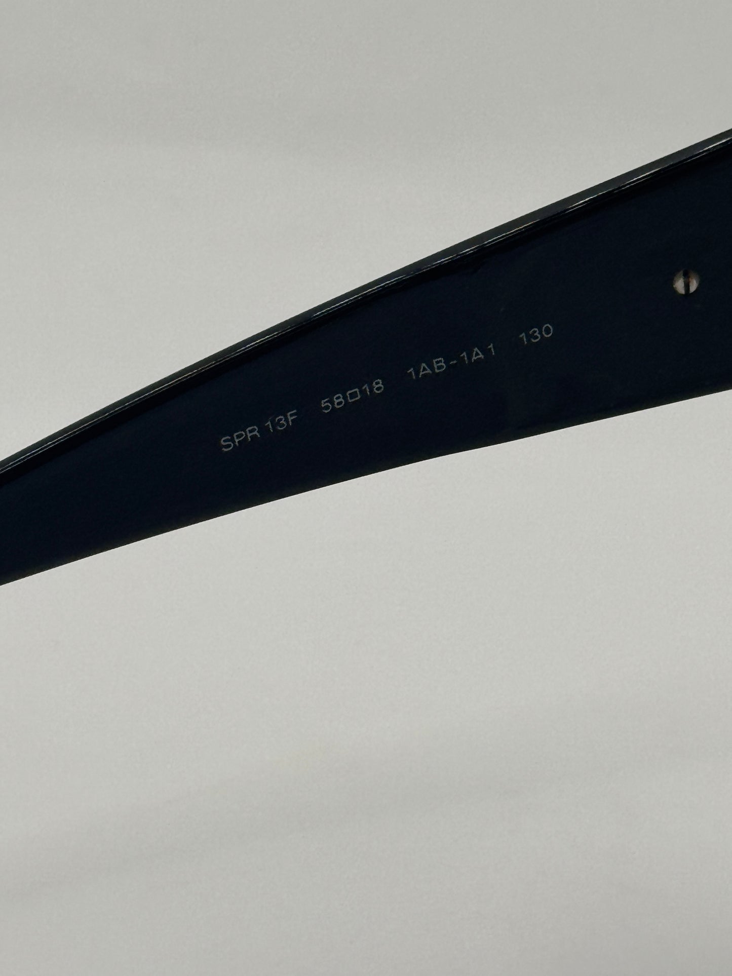 Prada Spr13f Sunglasses in color 1ab1a1