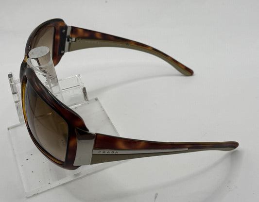 Prada Spr01h Sunglasses in color 4bw6s1