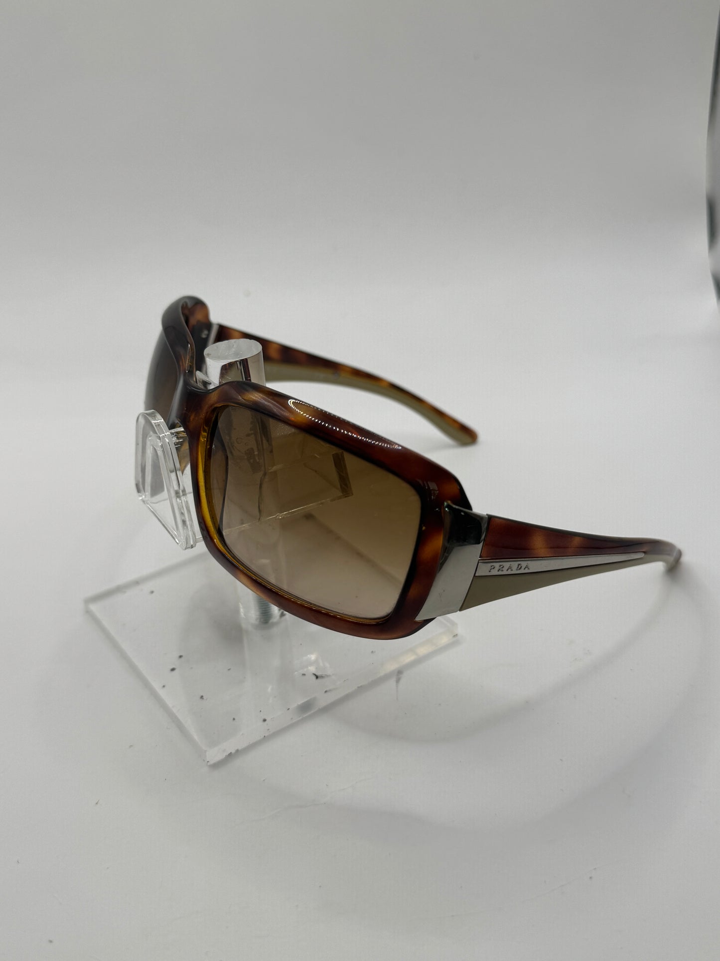 Prada Spr01h Sunglasses in color 4bw6s1