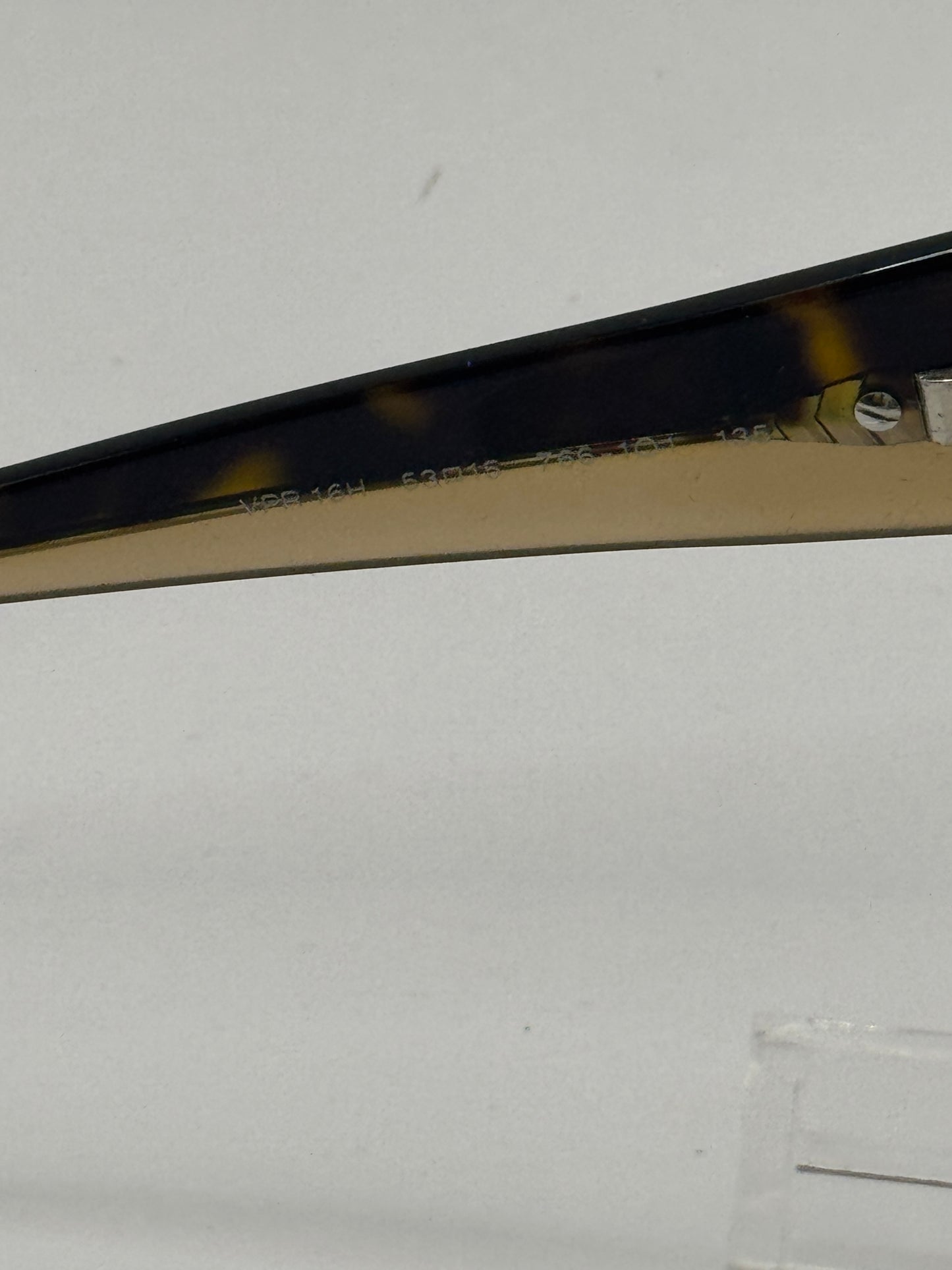 Prada Vpr16h Eyeglasses in color 7661o1