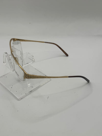 Prada Vpr55h Eyeglasses in color 5ak1o1