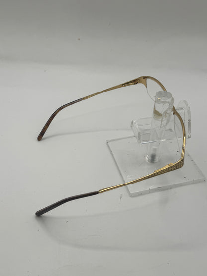 Prada Vpr55h Eyeglasses in color 5ak1o1