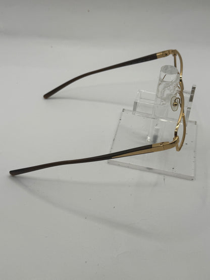 Prada Vpr56i Eyeglasses in color 5ak1o1