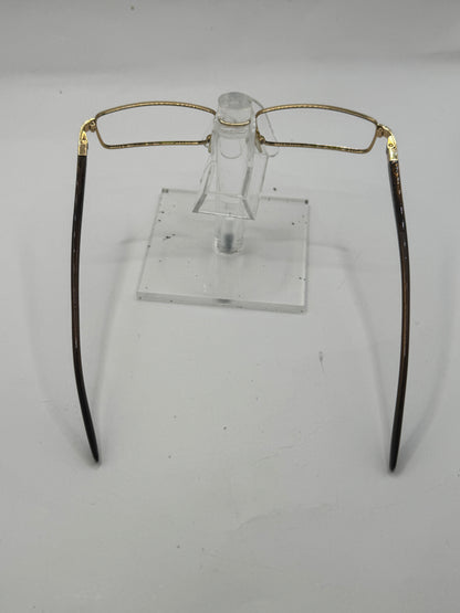 Prada Vpr56i Eyeglasses in color 5ak1o1
