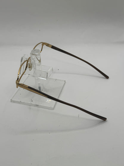 Prada Vpr56i Eyeglasses in color 5ak1o1